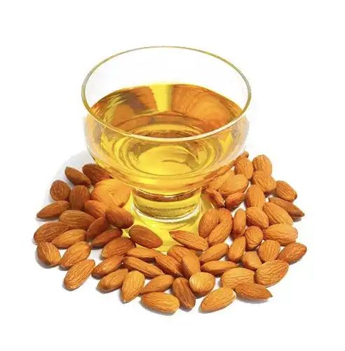 Oil for lip balm, showing almond oil in a glass dish